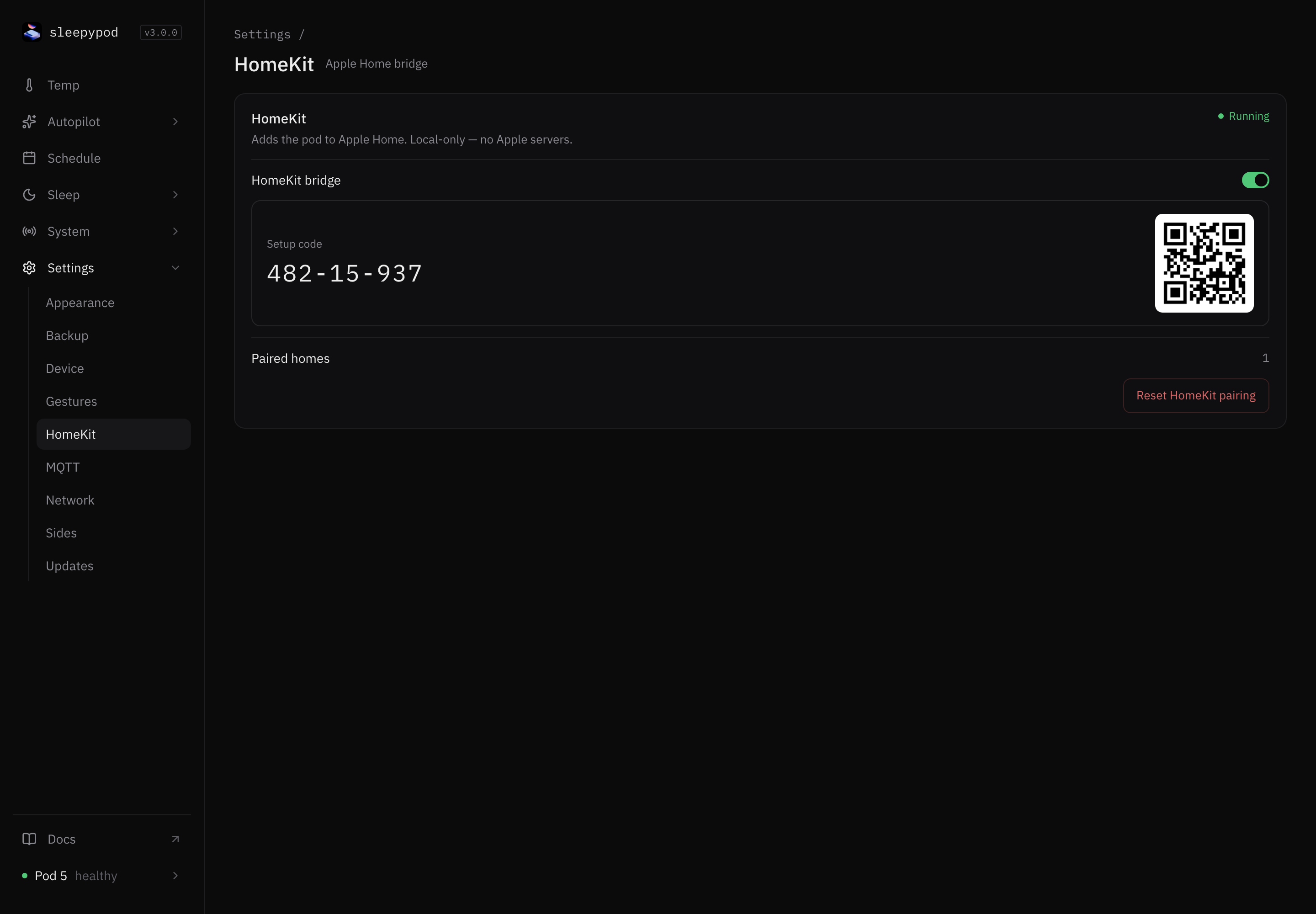 HomeKit settings with the bridge running, an eight-digit setup code, a pairing QR code, one paired home, and Reset HomeKit pairing