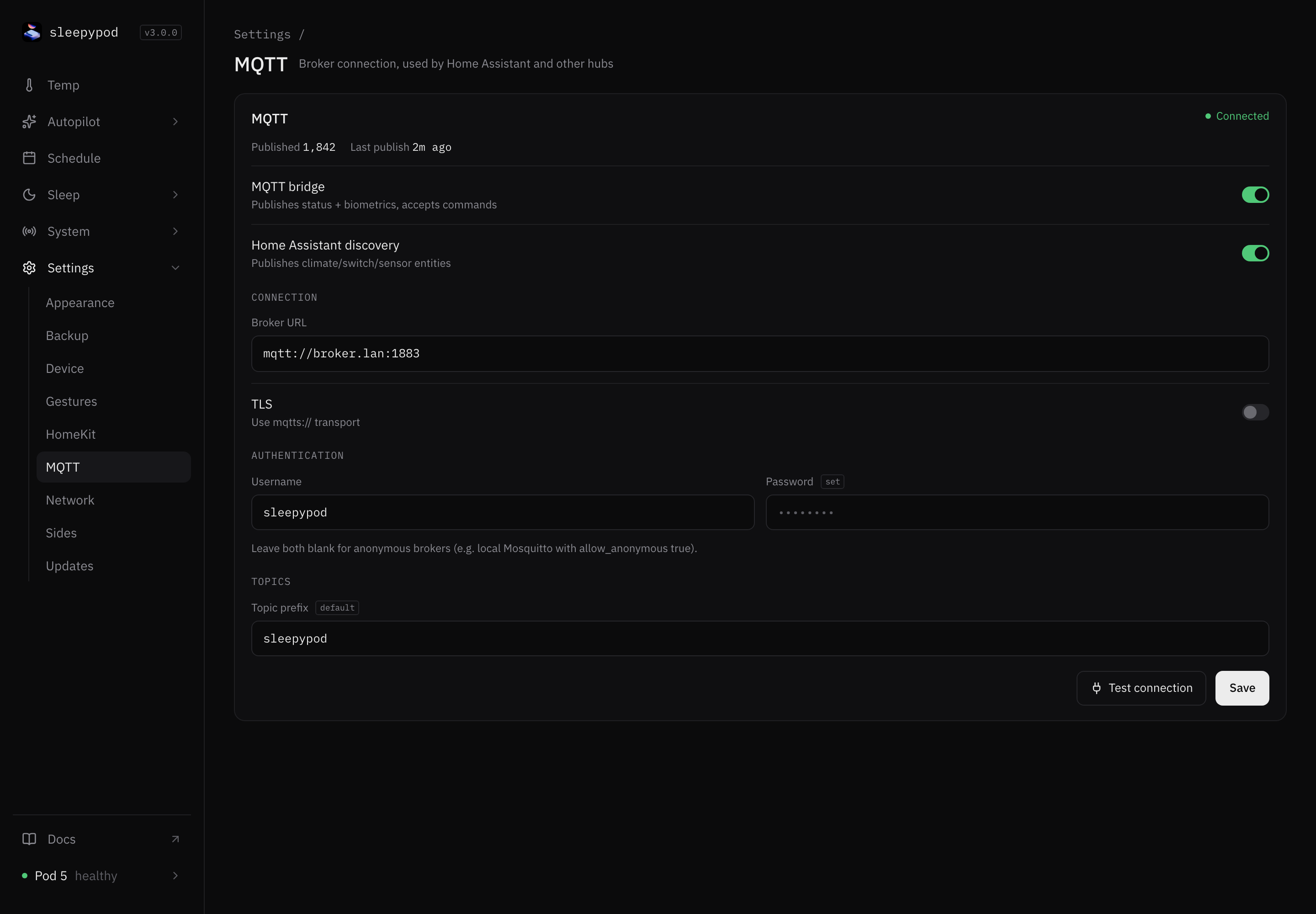 MQTT settings connected to an example broker, with bridge and Home Assistant discovery switches, broker URL, TLS, username, password, and topic prefix